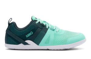 A turquoise and dark teal Prio Women's sneaker by Xero Shoes, featuring top features like a white sole, mesh detailing on the toe and sides, lace-up closure, a pull tab at the heel, and "XERO" printed on the side.